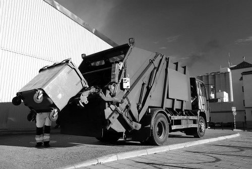 Professional house clearance team assisting a Woolwich homeowner