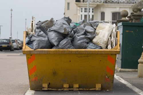 Van outside a Woolwich business preparing for waste removal